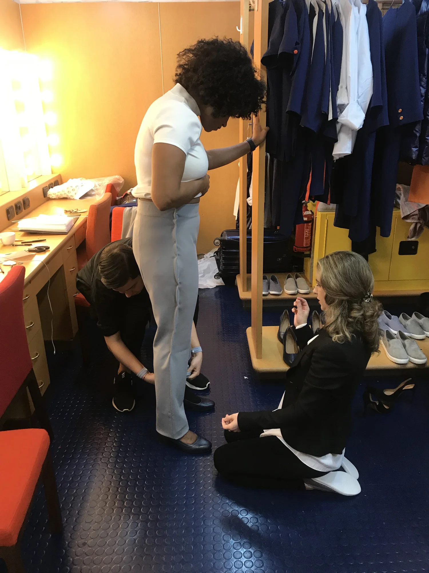 Wear testing uniforms with company ambassadors on board a ship